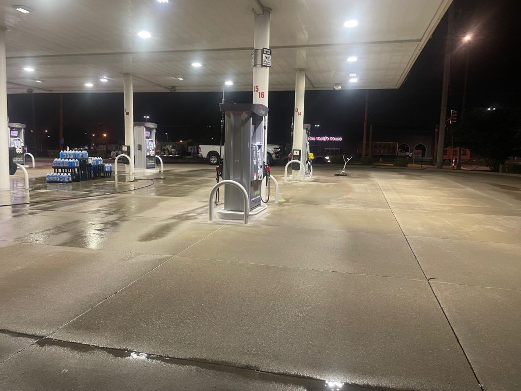 Gas station lot with freshly cleaned concrete